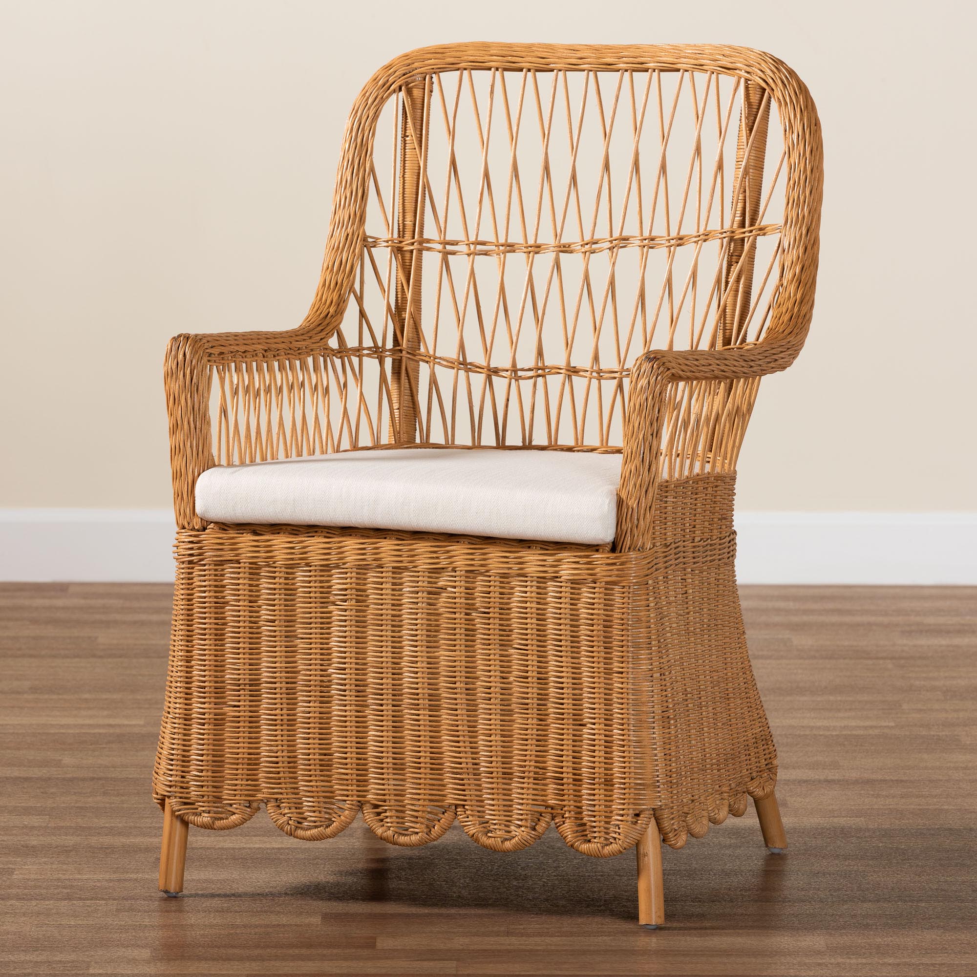 Bali-Style Bohemian Light Honey Rattan Arm Chair Named Teresa with Scalloped Base and Removable Seat Cushion for Tropical Home Decor